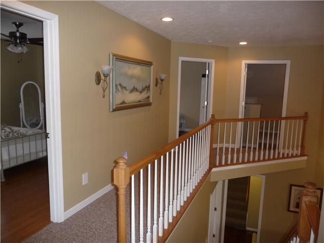 1250 Walter Head Road Adams, TN 37010 - Photo 12 of 20 a view of a hallway with windows and stairs