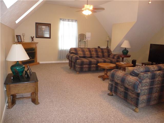 1250 Walter Head Road Adams, TN 37010 - Photo 13 of 20 a living room with furniture and a lamp