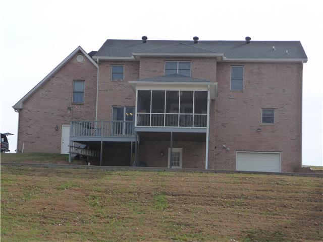 1250 Walter Head Road Adams, TN 37010 - Photo 4 of 20 a front view of a house with a yard