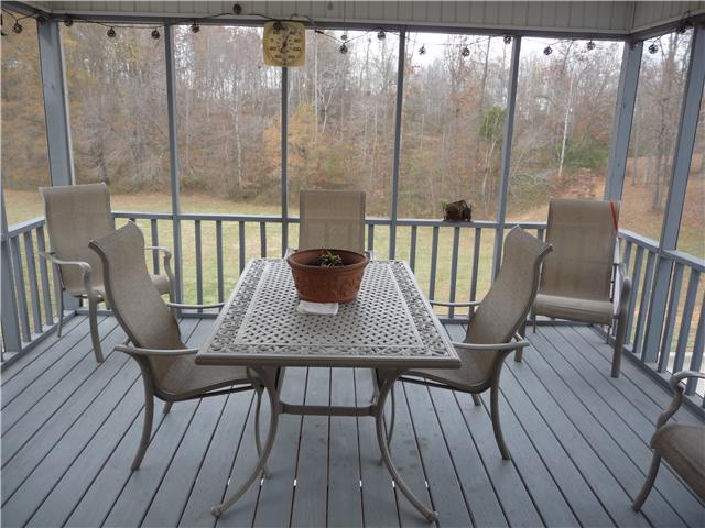 1250 Walter Head Road Adams, TN 37010 - Photo 8 of 20 a view of a dining room with furniture window and outside view