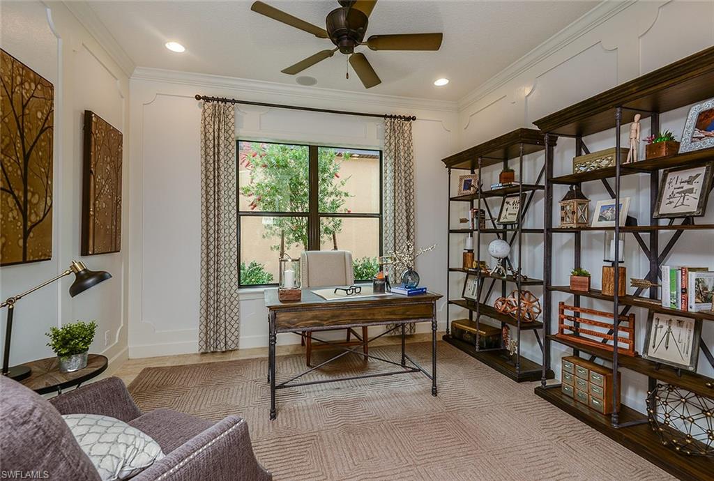 8558 Maggiore Court Naples, FL 34114 - Photo 20 of 32 a living room with furniture cabinets and a window