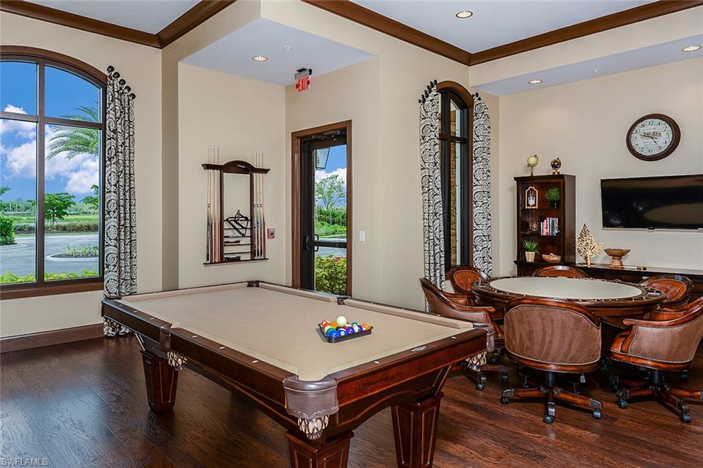 8558 Maggiore Court Naples, FL 34114 - Photo 25 of 32 a room with furniture pool table and flat screen tv
