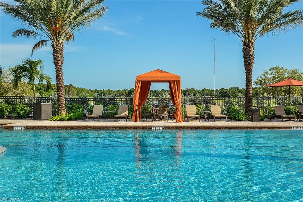 8558 Maggiore Court Naples, FL 34114 - Photo 30 of 32 a view of a house with a yard