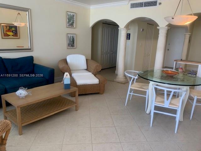 100 Lincoln Road, Unit 1434 Miami Beach, FL 33139 - Photo 2 of 29 a living room with furniture and a mirror
