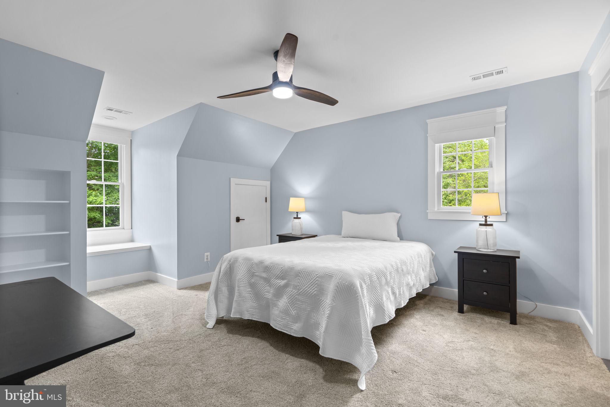 798 Creek View Road Severna Park, MD 21146 - Photo 32 of 72 a bedroom with a bed and window