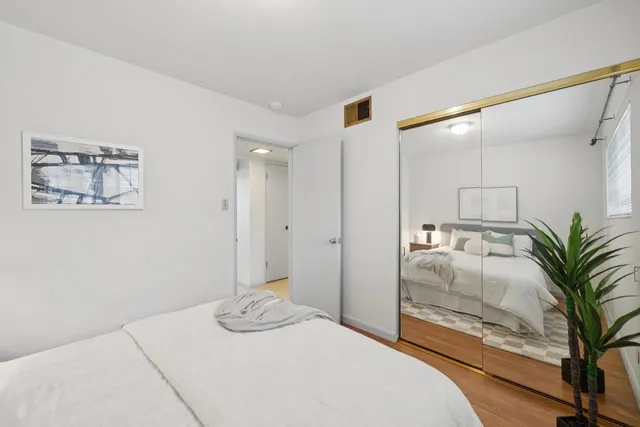 a bathroom with a sink double vanity and a mirror