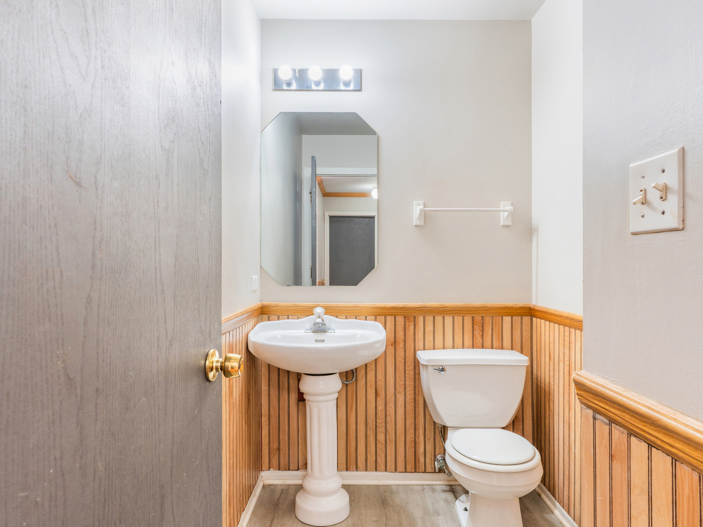 2433 Caton Crest Court Crest Hill, IL 60403 - Photo 13 of 18 a bathroom with a toilet sink and mirror