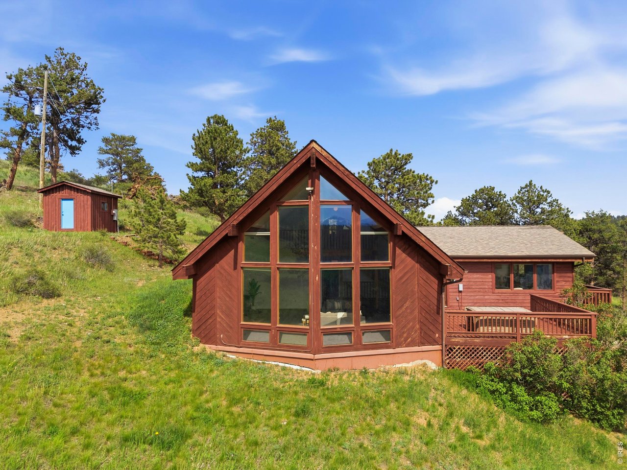8238 Sugarloaf Road Boulder, CO 80302 - Photo 3 of 45 Large Windows looking West toward the Continental Divide
