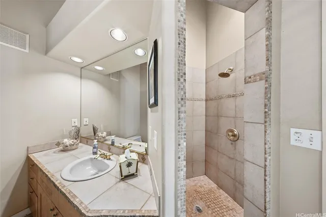 an aerial view of a house with a yard and garden