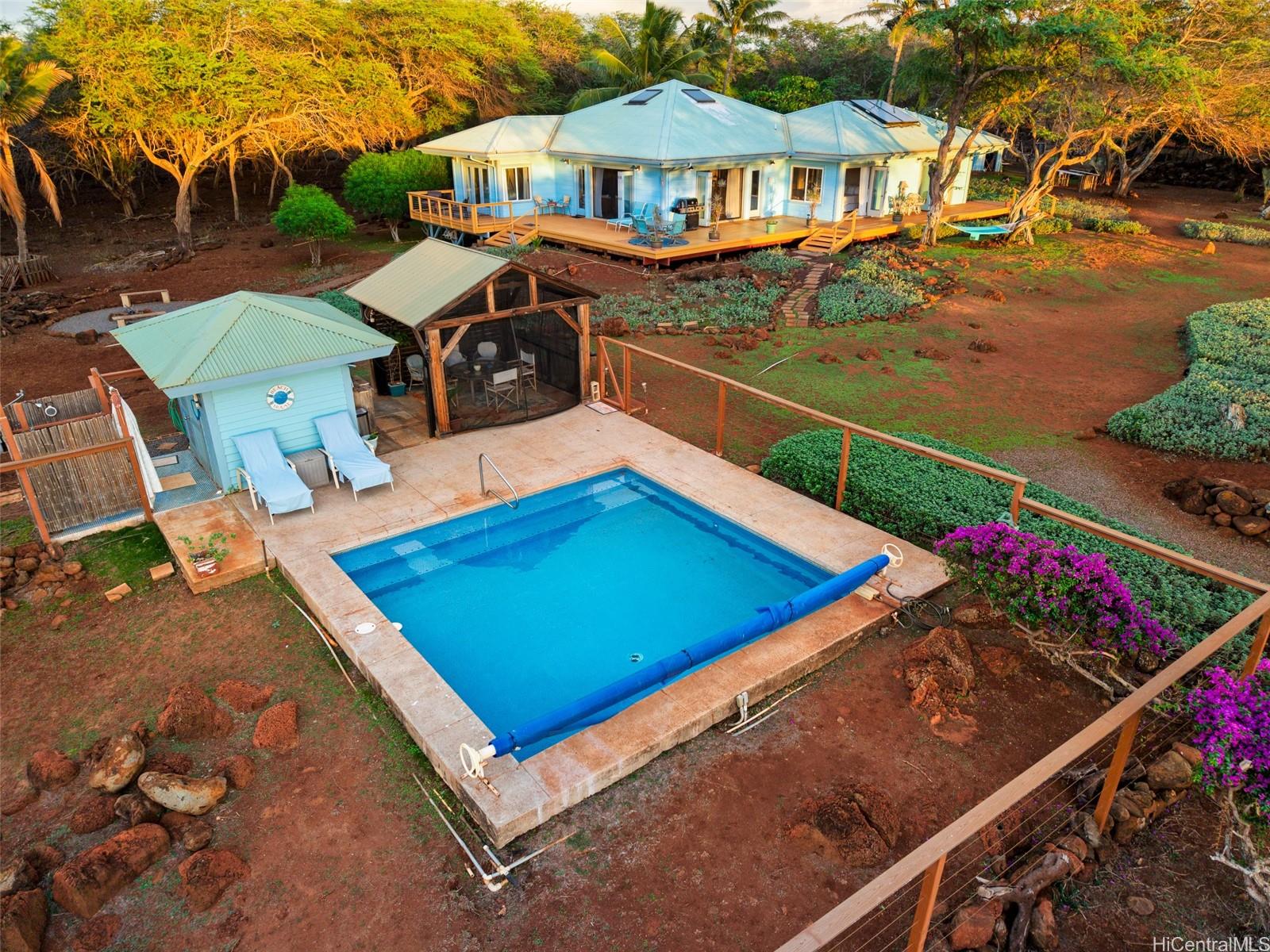 4720 Pohakuloa Road Maunaloa, HI 96770 - Photo 15 of 20 an aerial view of a house with swimming pool