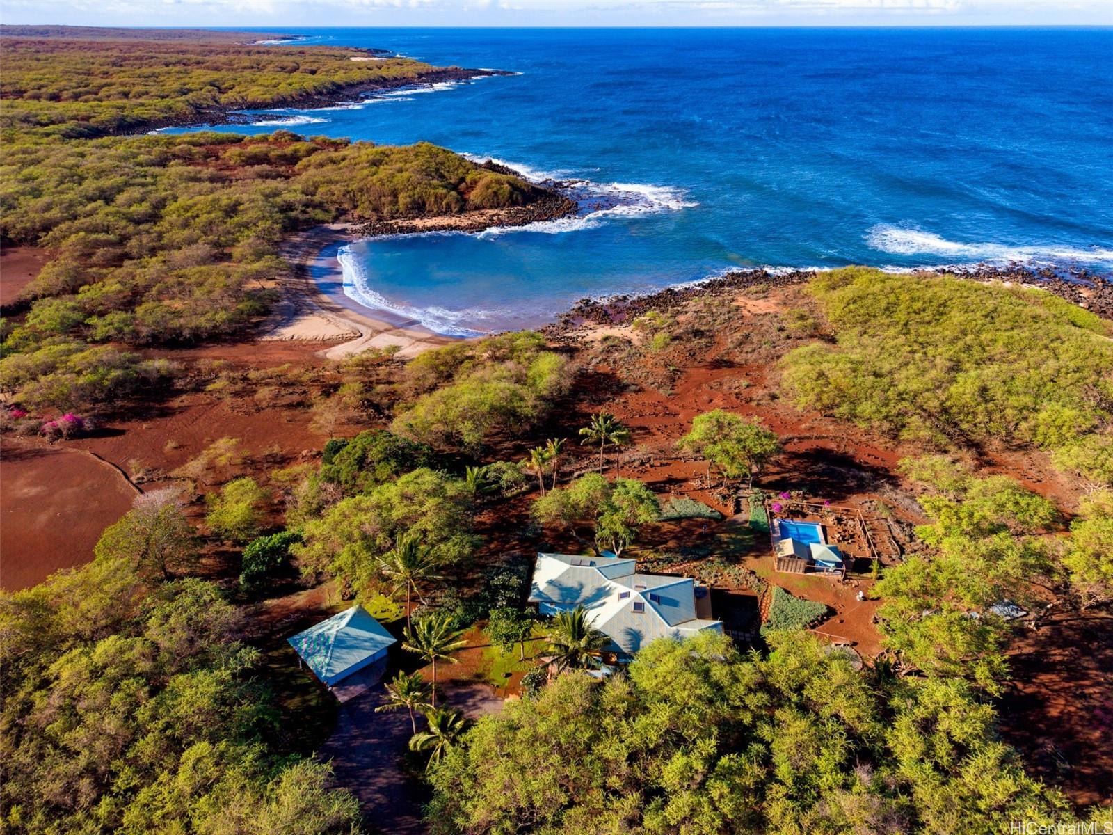 4720 Pohakuloa Road Maunaloa, HI 96770 - Photo 18 of 20 an aerial view of ocean beach and residential houses with outdoor space