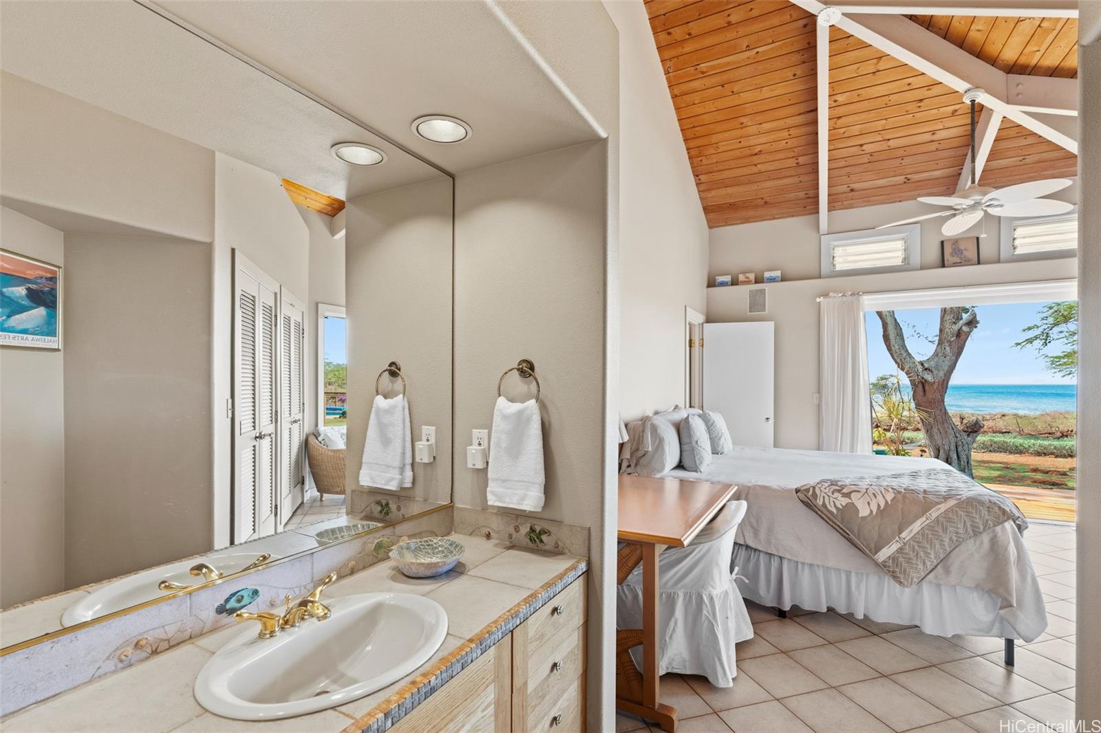 4720 Pohakuloa Road Maunaloa, HI 96770 - Photo 10 of 20 a bathroom with a double vanity sink and a mirror