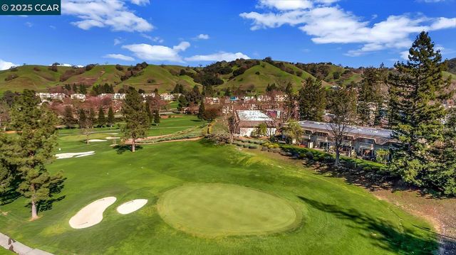 a view of a lake with a mountain in the background