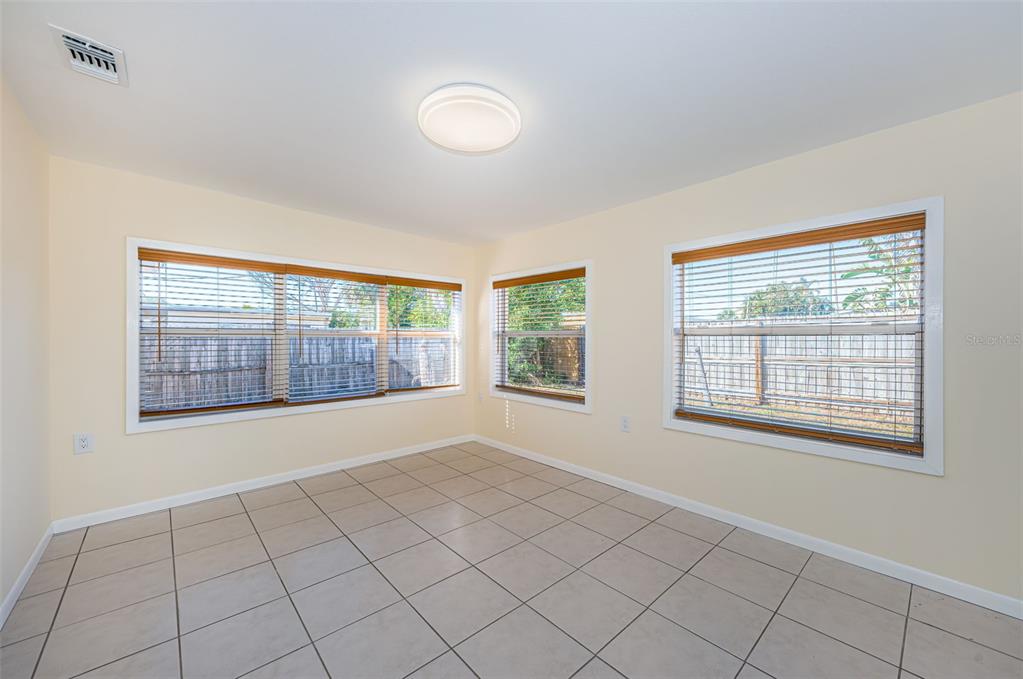 713 Pruitt Drive Madeira Beach, FL 33708 - Photo 17 of 62 a view of an empty room with a window
