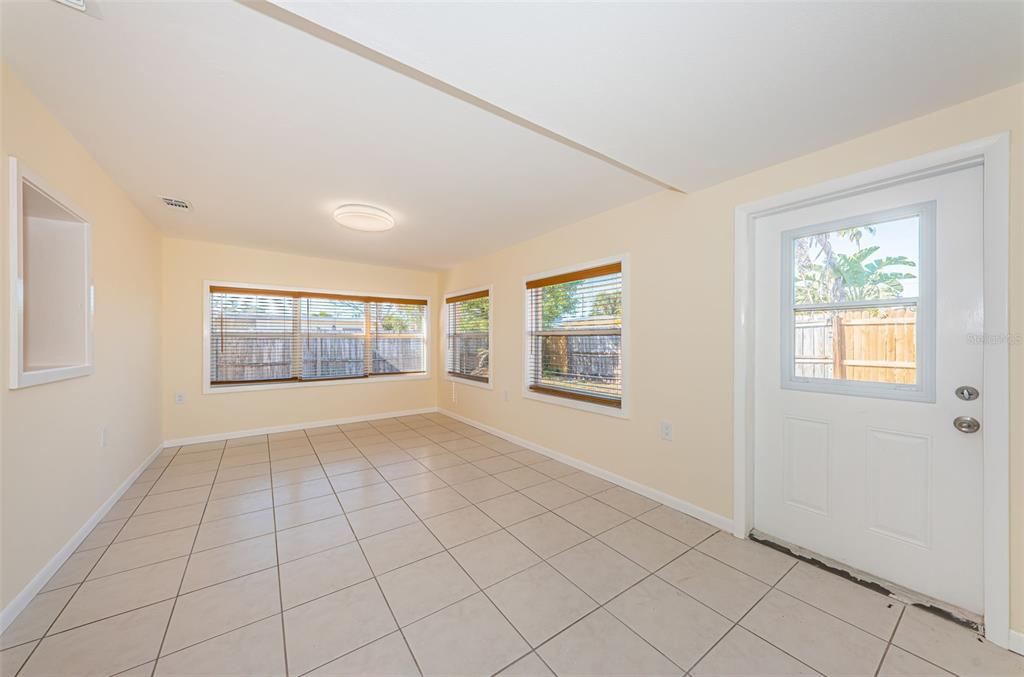 713 Pruitt Drive Madeira Beach, FL 33708 - Photo 18 of 62 a view of an empty room with a window