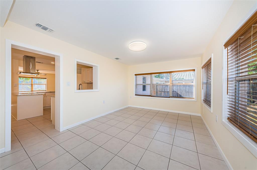 713 Pruitt Drive Madeira Beach, FL 33708 - Photo 19 of 62 a view of an empty room with a window