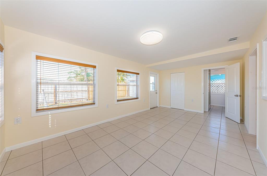 713 Pruitt Drive Madeira Beach, FL 33708 - Photo 21 of 62 an empty room with windows