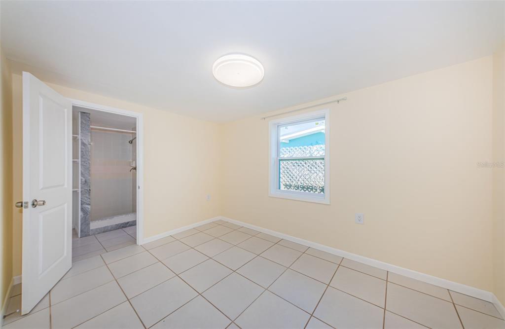 713 Pruitt Drive Madeira Beach, FL 33708 - Photo 22 of 62 a view of an empty room and window