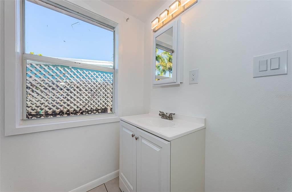 713 Pruitt Drive Madeira Beach, FL 33708 - Photo 26 of 62 a utility room with a window