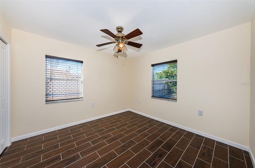 713 Pruitt Drive Madeira Beach, FL 33708 - Photo 32 of 62 a view of an empty room with a window
