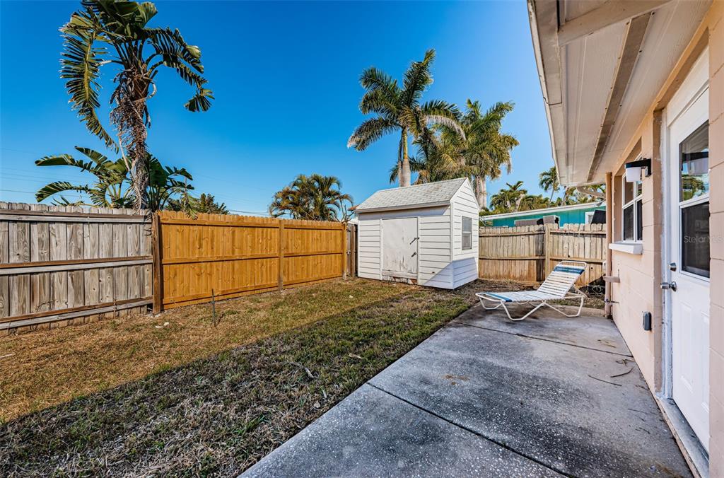 713 Pruitt Drive Madeira Beach, FL 33708 - Photo 36 of 62 a view of a backyard