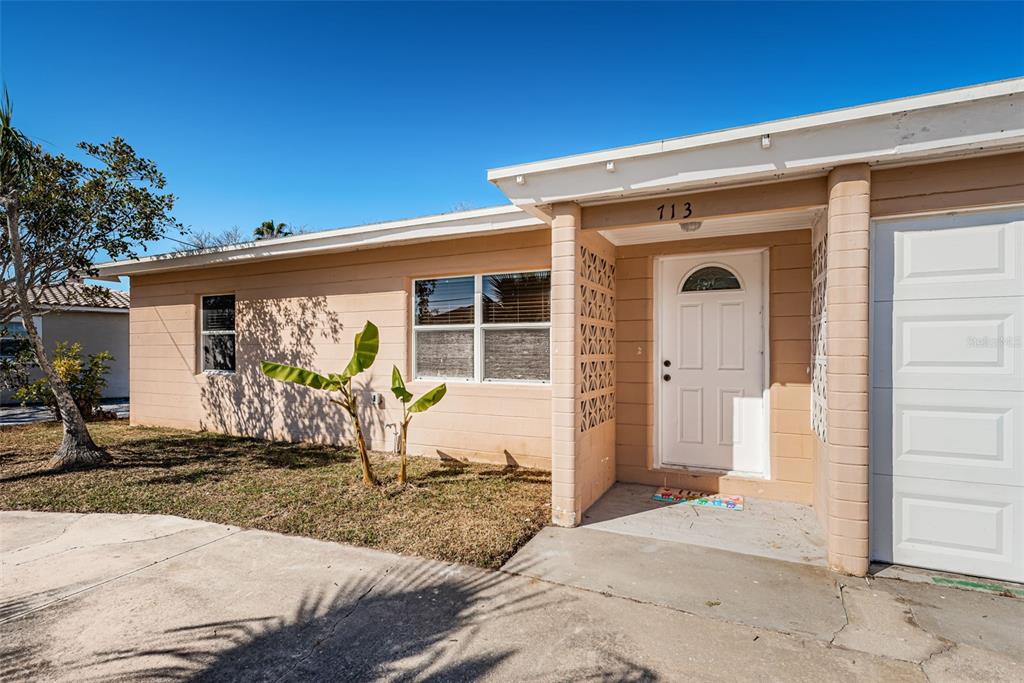 713 Pruitt Drive Madeira Beach, FL 33708 - Photo 4 of 62 a front view of a house