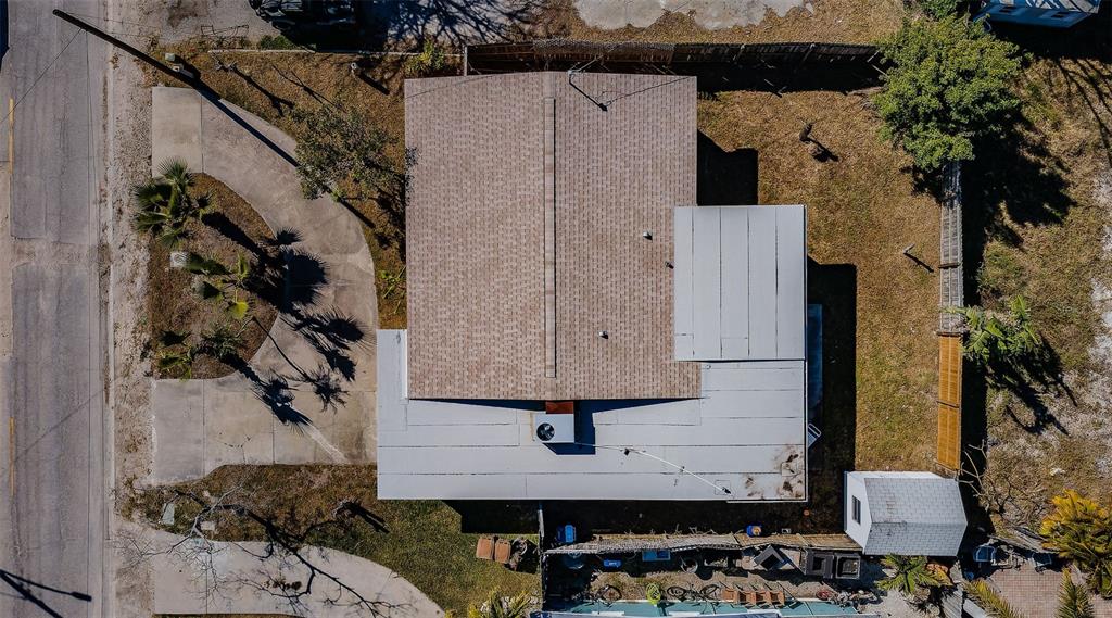713 Pruitt Drive Madeira Beach, FL 33708 - Photo 54 of 62 a aerial view of a house with garden