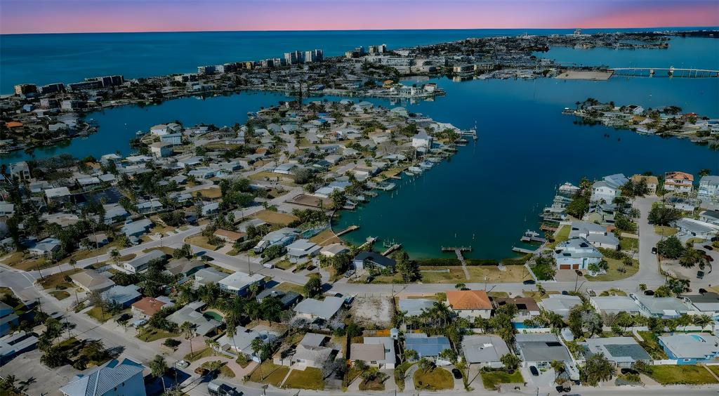 713 Pruitt Drive Madeira Beach, FL 33708 - Photo 62 of 62 a view of a lake with a mountain view