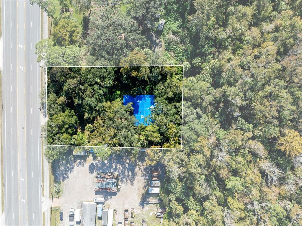 420 Monroe Road Sanford, FL 32771 - Photo 12 of 28 a view of a lake with a building in the background