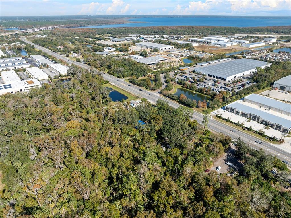 420 Monroe Road Sanford, FL 32771 - Photo 17 of 28 an aerial view of residential building and trees