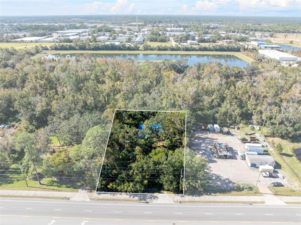 420 Monroe Road Sanford, FL 32771 - Photo 24 of 28 an aerial view of residential houses with outdoor space and ocean view