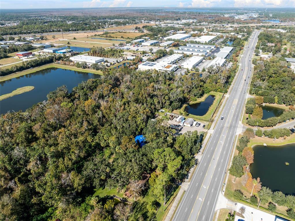 420 Monroe Road Sanford, FL 32771 - Photo 25 of 28 an aerial view of residential houses with outdoor space and river