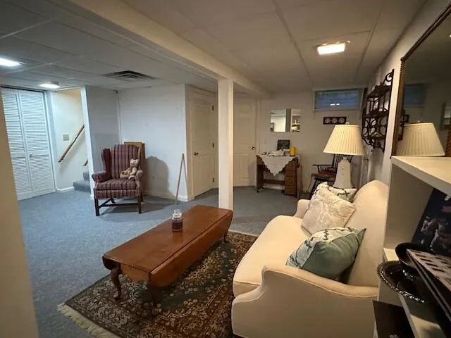 a living room with furniture and a couch