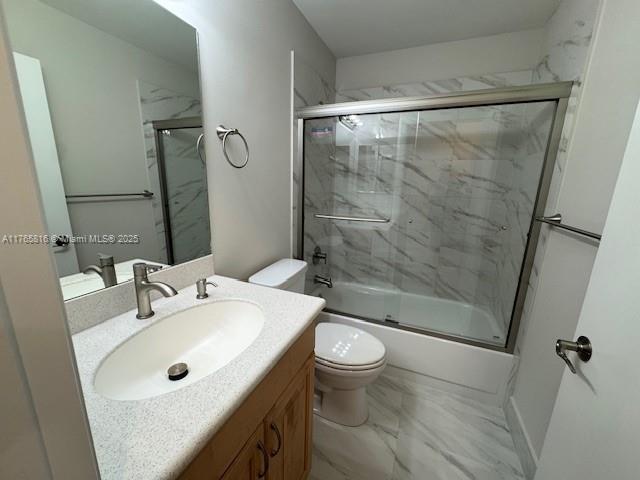 9317 Arborwood Circle Davie, FL 33328 - Photo 16 of 24 a bathroom with a sink mirror toilet and shower
