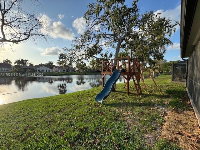 9317 Arborwood Circle Davie, FL 33328 - Photo 23 of 24 a view of a lake