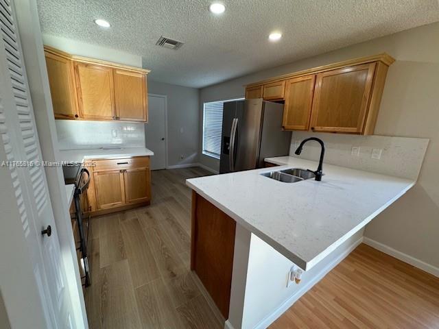9317 Arborwood Circle Davie, FL 33328 - Photo 6 of 24 a kitchen with a sink appliances and cabinets