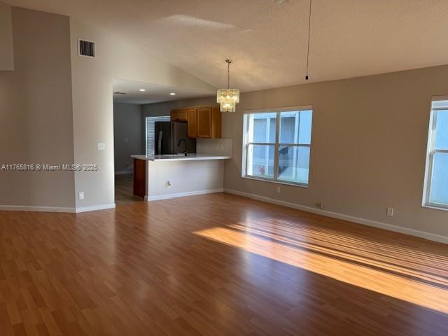 9317 Arborwood Circle Davie, FL 33328 - Photo 9 of 24 a view of a kitchen with wooden floor and a window