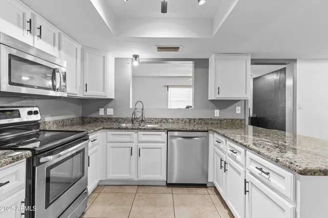 a view of a dining room with furniture