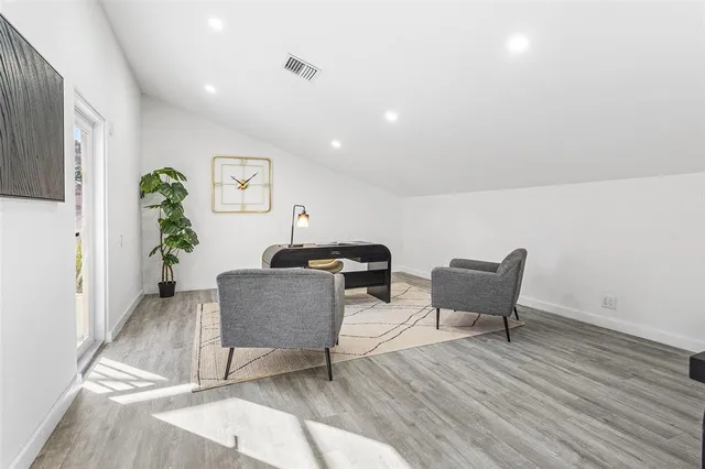 a bathroom with a sink toilet and mirror