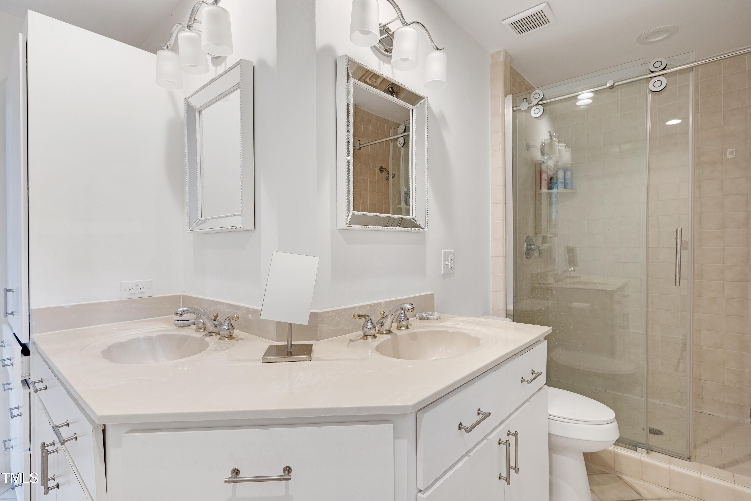 112 Queensferry Road Cary, NC 27511 - Photo 21 of 41 a bathroom with a sink and a mirror