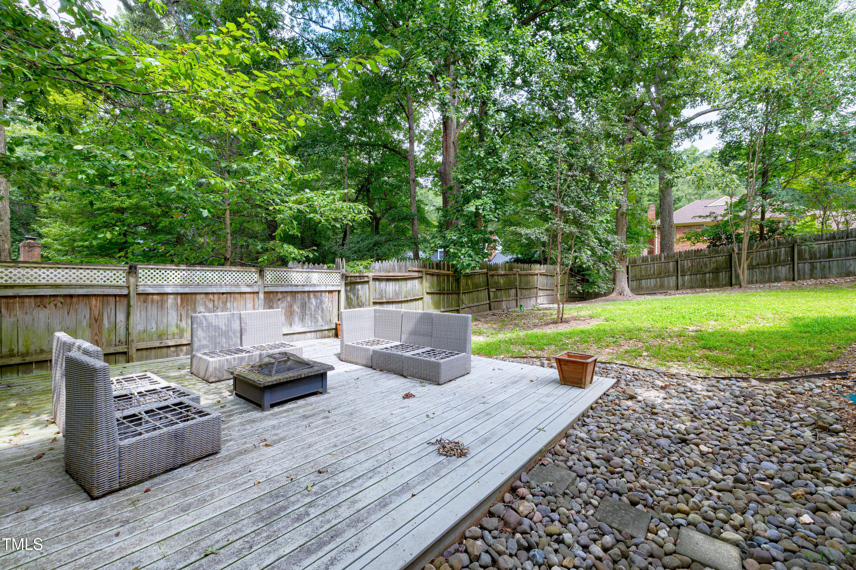 112 Queensferry Road Cary, NC 27511 - Photo 35 of 41 a view of a backyard with sitting area