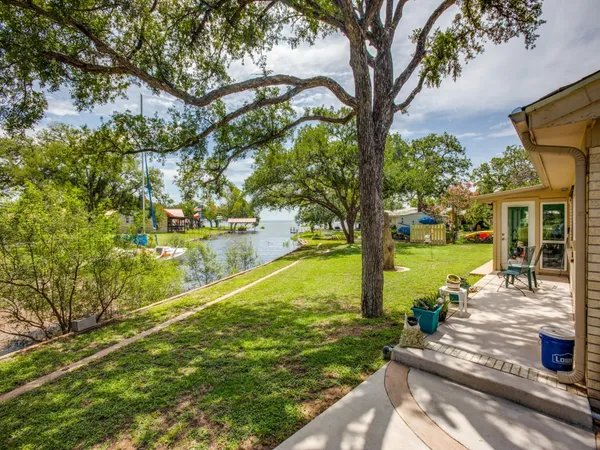 a view of a yard with an outdoor space