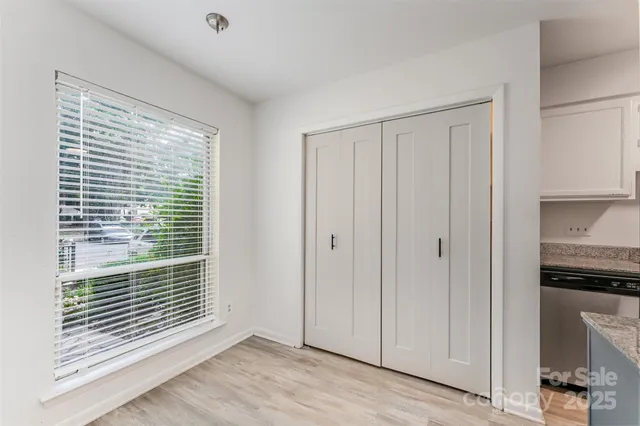 a view of a room that has a window in it