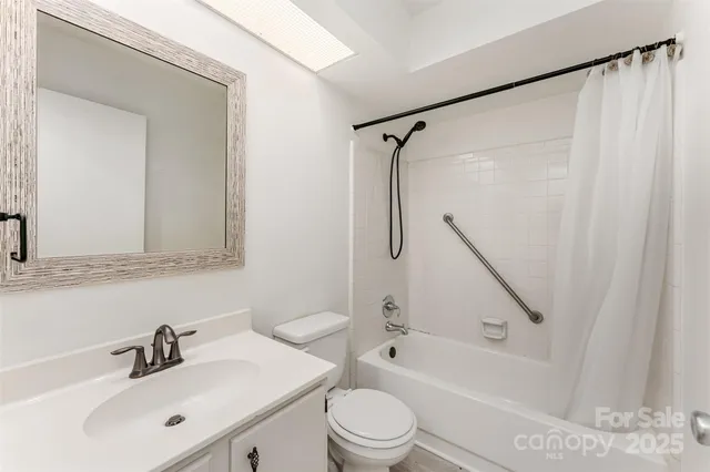 a bathroom with a sink a toilet and a bathtub