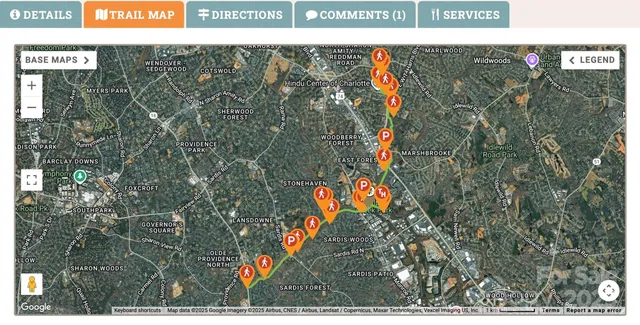 a view of backyard with large trees