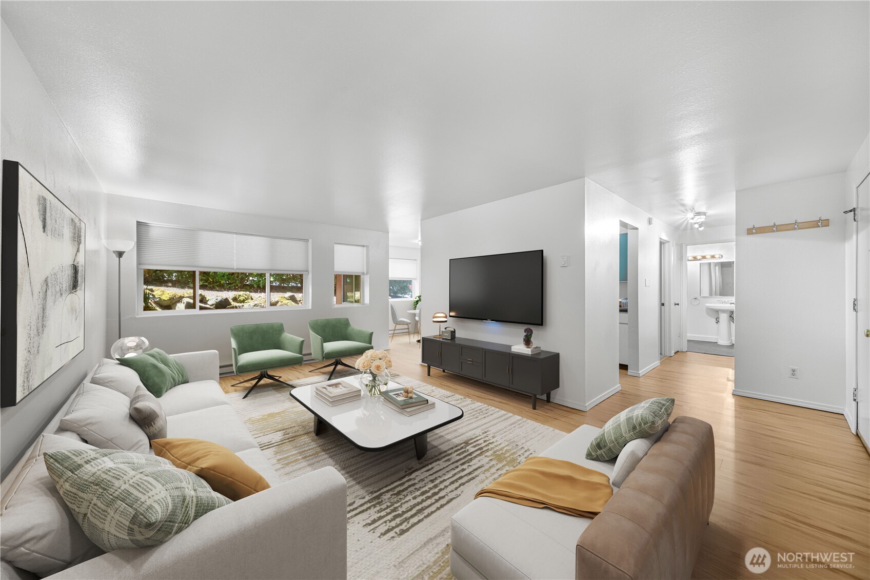 7021 Sand Point Way Northeast, Unit B201 Seattle, WA 98115 - Photo 1 of 29 a living room with furniture and a flat screen tv