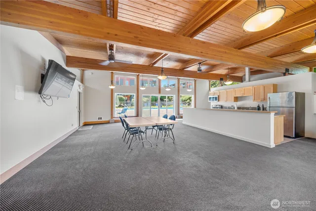 a view of a swimming pool with lounge chair
