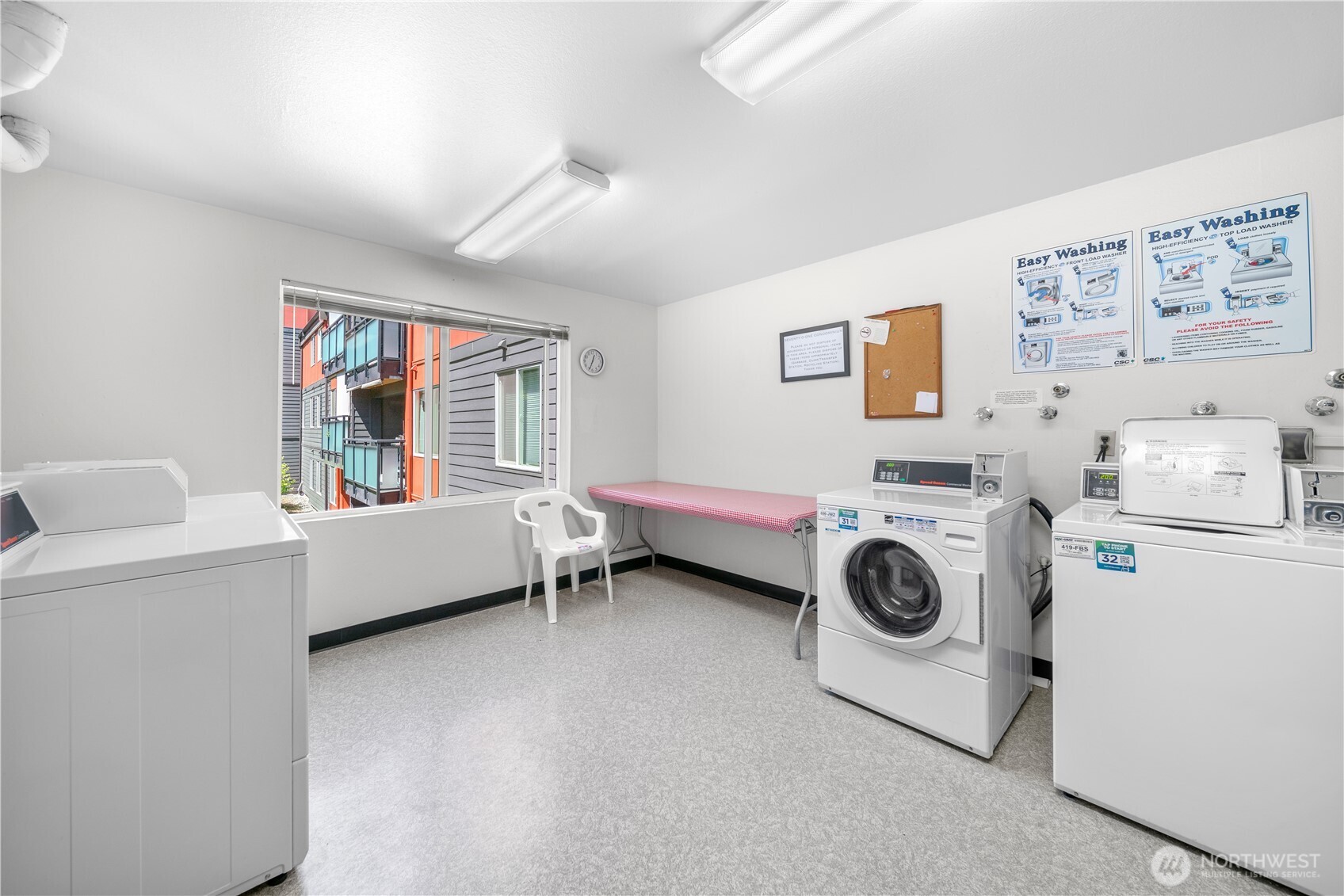7021 Sand Point Way Northeast, Unit B201 Seattle, WA 98115 - Photo 16 of 29 a utility room with dryer and washer