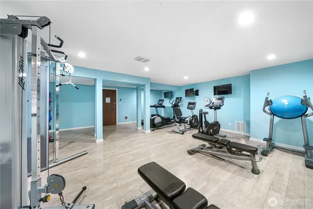 a group of bicycles are parked in a room