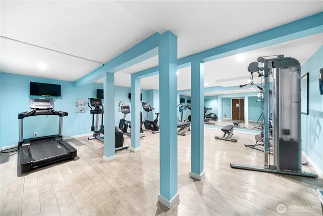 a view of backyard with wooden fence